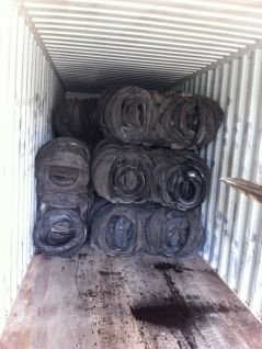 baled tyres in container